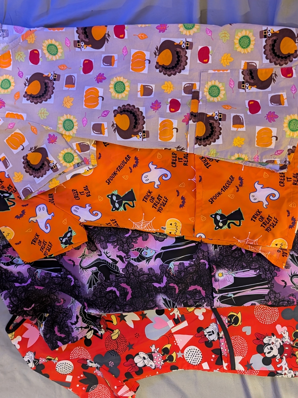 Women's Holiday Scrub Tops. Variety Of Colorful Cute Holiday Patterns